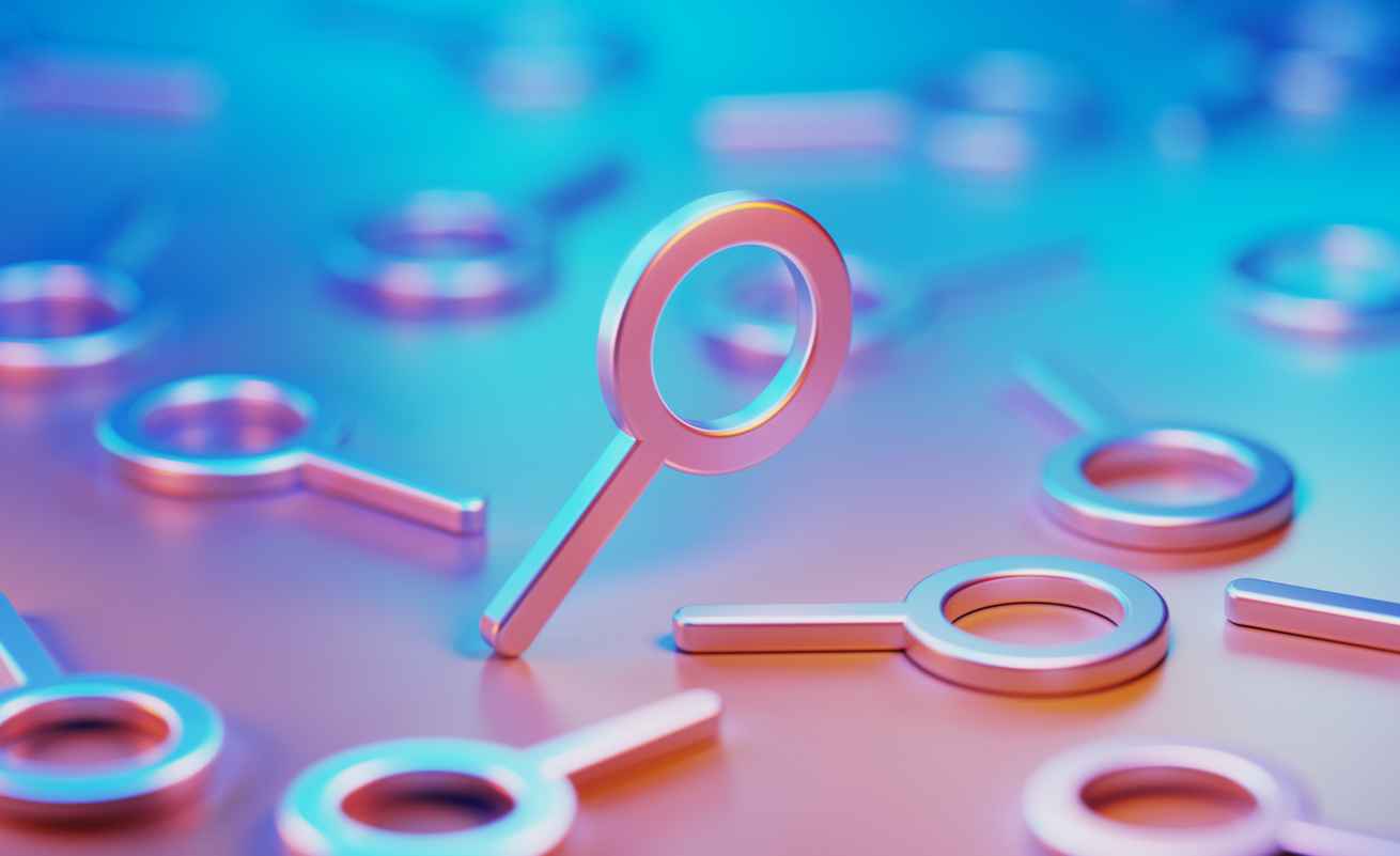 Metallic magnifier symbols illuminated by blue and pink lights on blue and pink background; benefits of local SEO